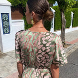 Carina – Rochie Midi Satinată cu Efect de Cupru